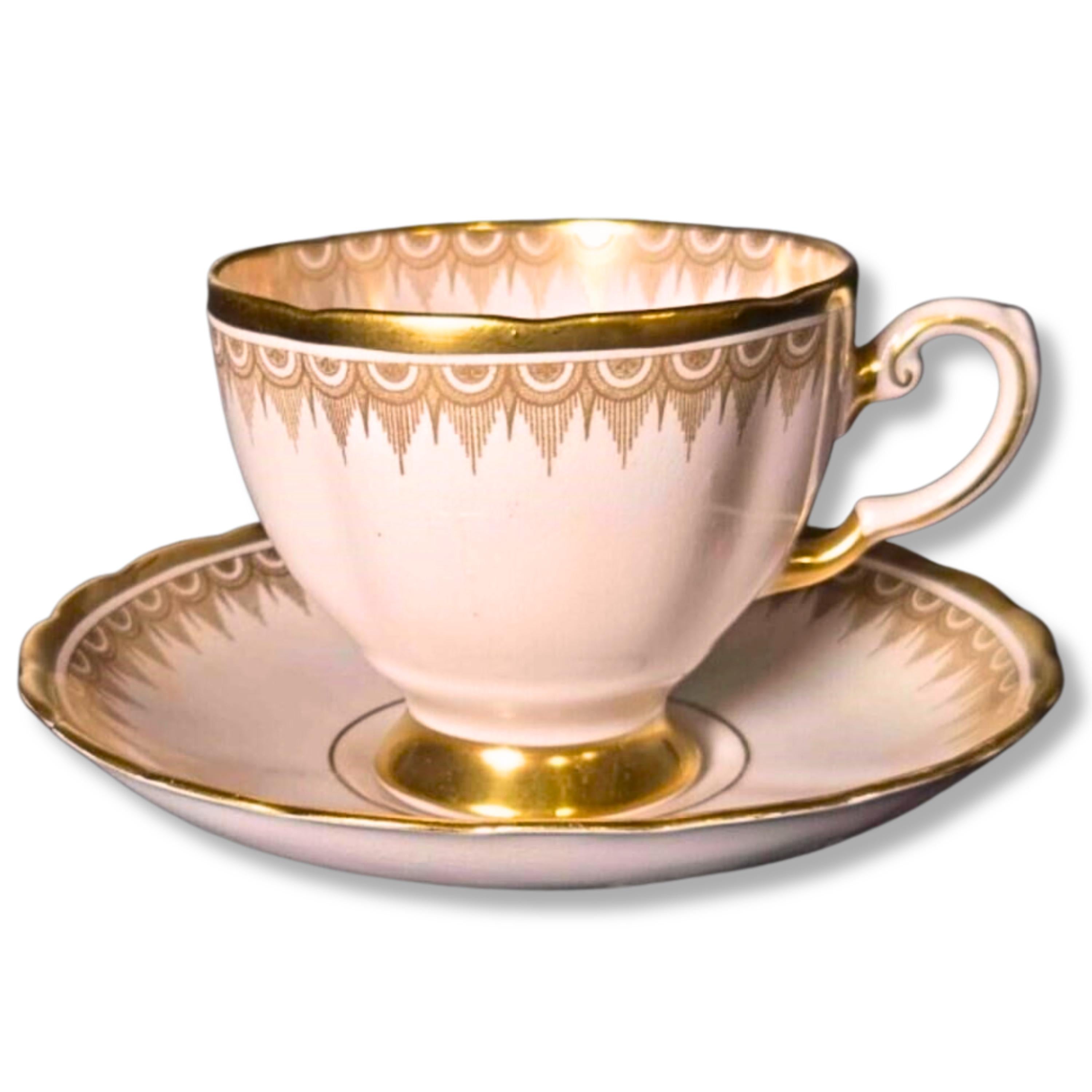 Tuscan Plant Teacup & Saucer: Pink with Gold Festoon Border, Pattern 7660 II, England 1940s