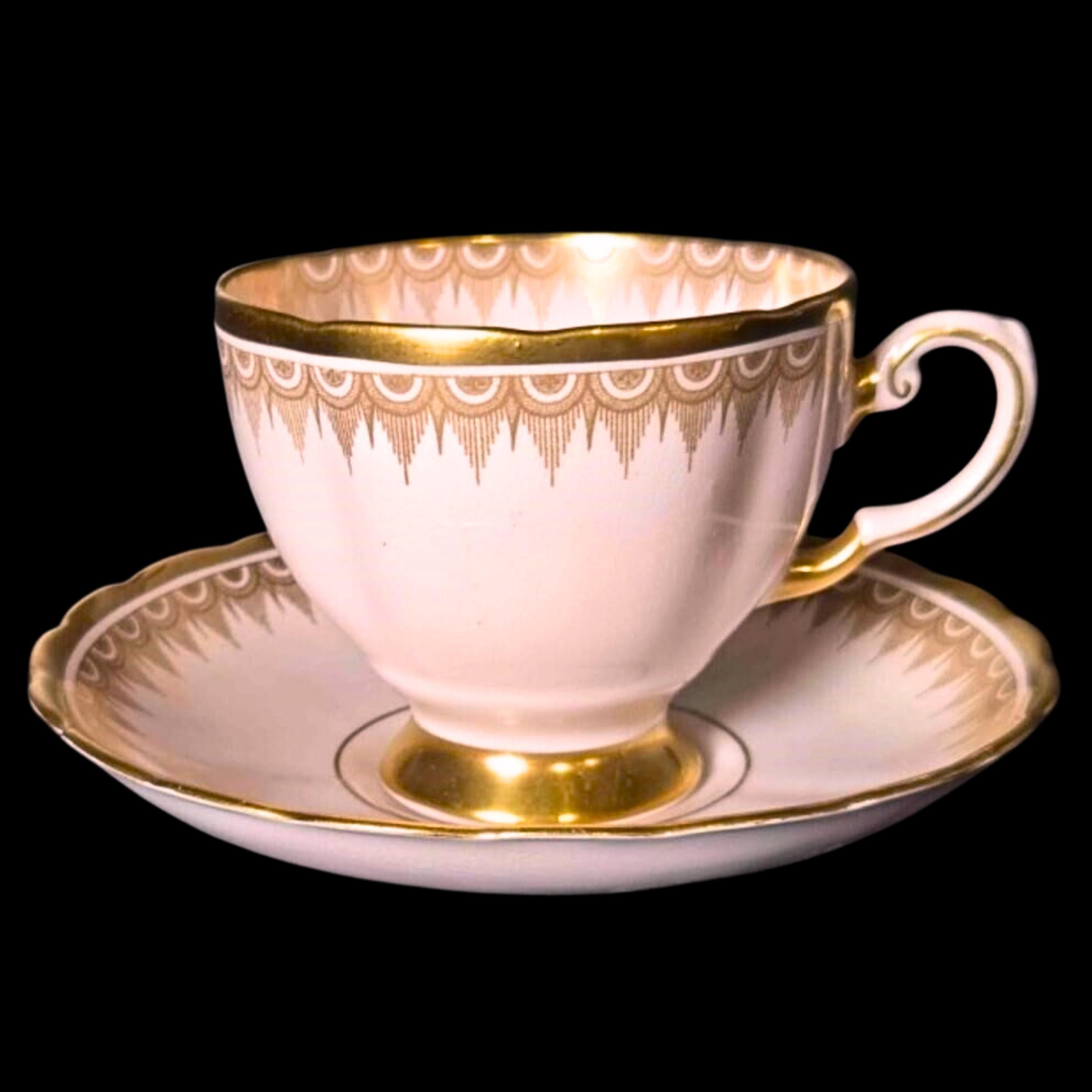 Tuscan Plant Teacup & Saucer: Pink with Gold Festoon Border, Pattern 7660 II, England 1940s
