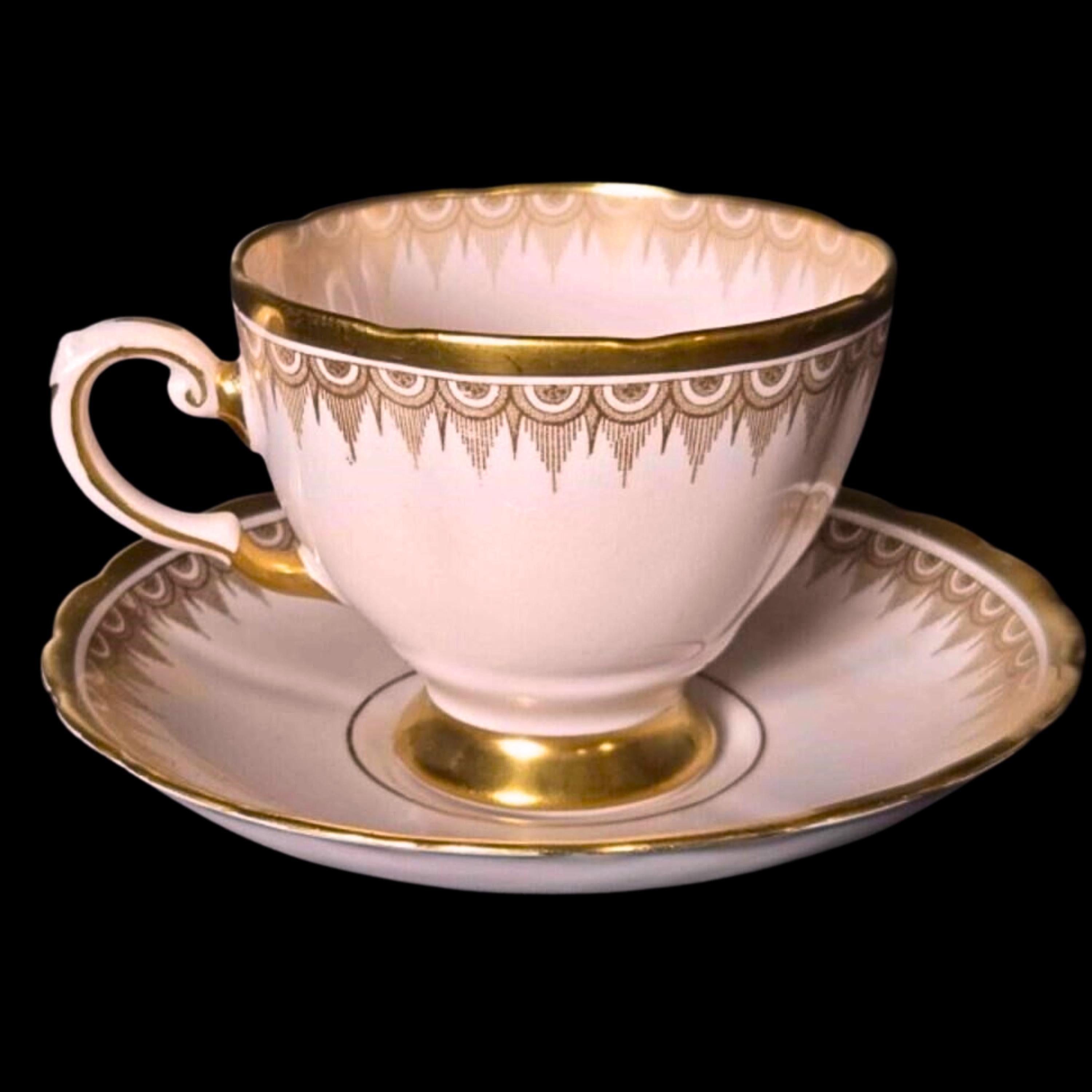 Tuscan Plant Teacup & Saucer: Pink with Gold Festoon Border, Pattern 7660 II, England 1940s